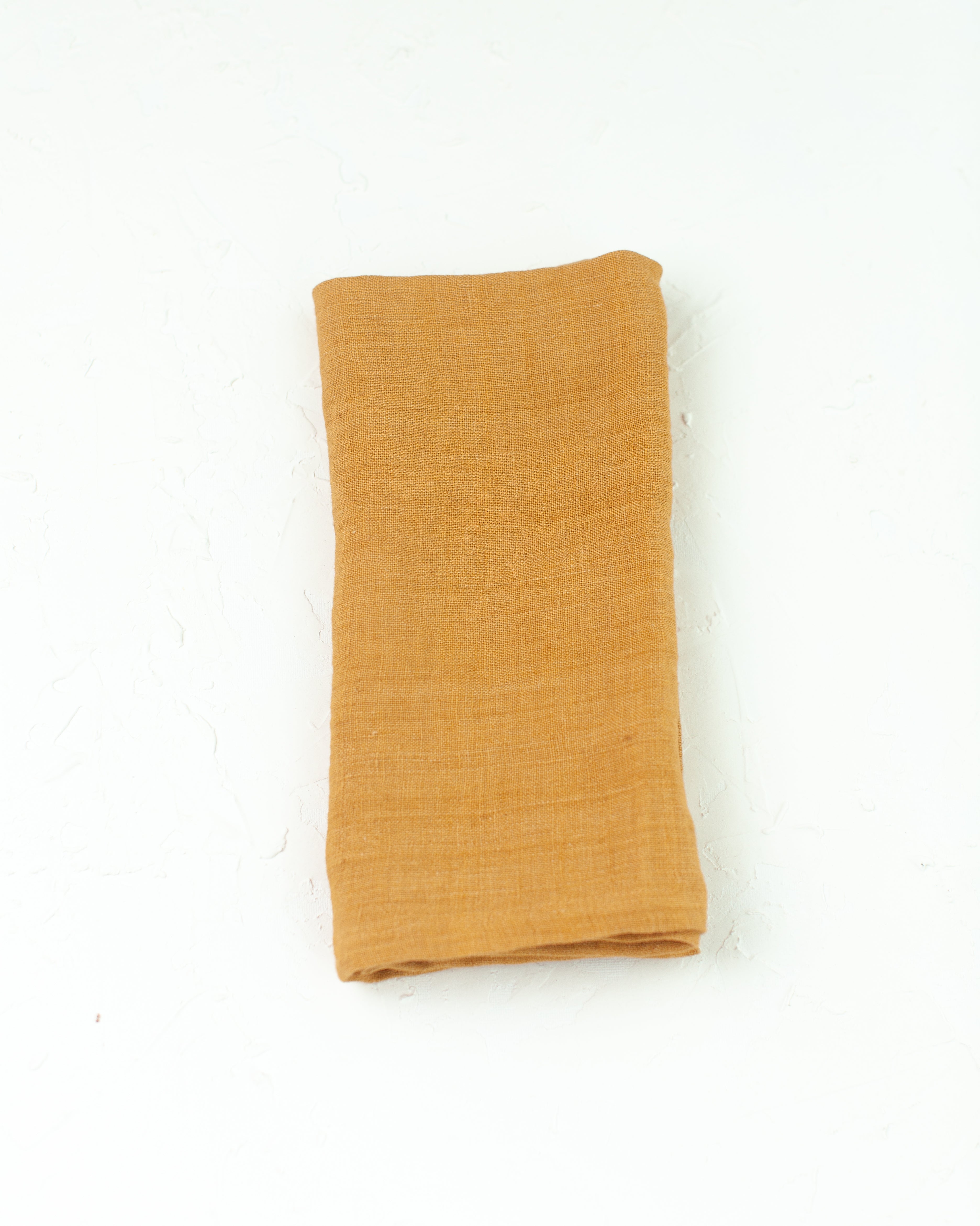 gold stone washed linen hemmed napkin
